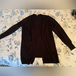 Women’s black cardigan.